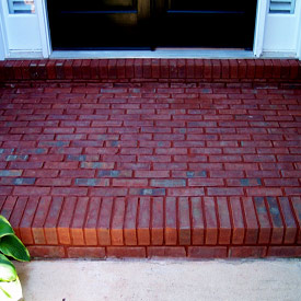 Desert Tile and Grout Care cleans up this brick entryway nicely, removing months of dust and dirt build up in Tempe Arizona