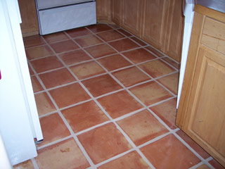 We were able to remove all the layers of dirt, returning these tiles to their original color with the white grout