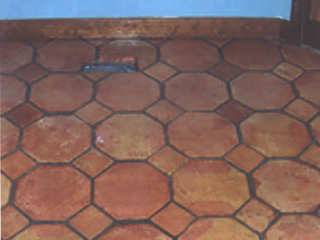 This kitchen in Mesa Arizona has a black-colored grout which was originally white which is something our company specializes in restoring