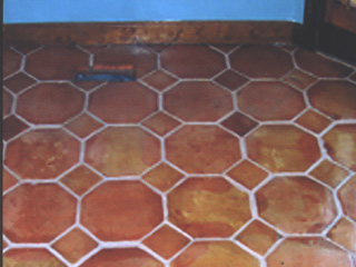 This floor, which previously had a black colored grout due to years of dirt build up, now has a beautiful white grout after being cleaned and sealed