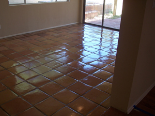 After being cleaned by Desert Tile and Grout Care this Mexican tile floor is restored to its original glossy sheen