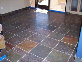 Arizona home stone tile floor looks drab and dirty