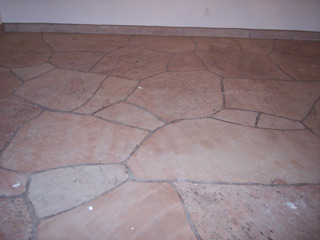 This stone floor looks dirty and needs a deep clean