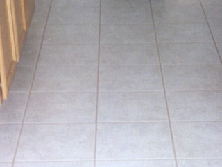 This brand-new looking tiled floor in Mesa Arizona is actually old flooring cleaned by our Grout and Tile Care service
