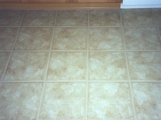 Desert Tile and Grout restored this ceramic tile floor back to its original state, including the white grout around it in Mesa Arizona