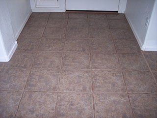 Flooring prior to cleaning in Mesa AZ with different colored grout due to ineffective cleaning methods