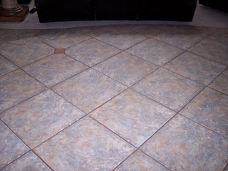 Ceramic tile and grout floor before Desert Tile & Grout Care cleaning services in Arizona