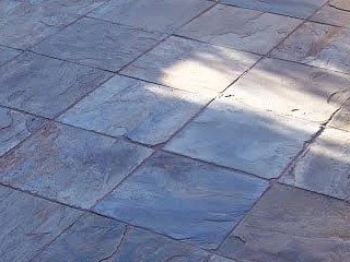 This picture shows a stone floor before it is cleaned by Josh Parkhouse, expert tile cleaner