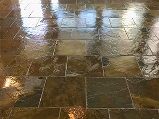 Slate floor restored by Desert Tile and Grout