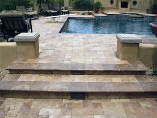well maintained travertine tile outside